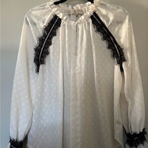 Loft ivory blouse with black eyelash trim.